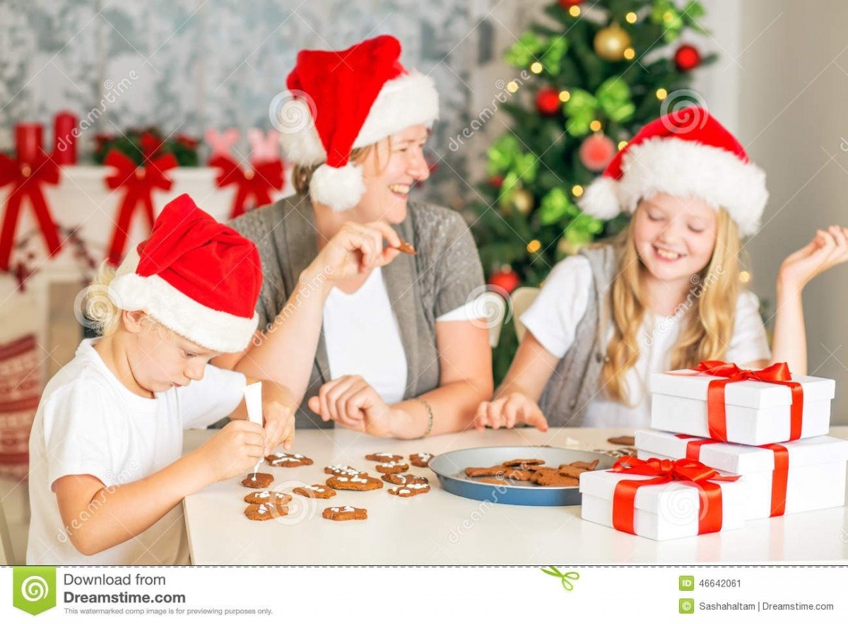 Happy Family Baking Christmas Cookies Stock Image