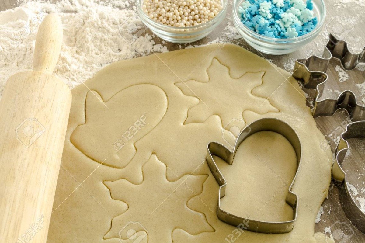 Snowflake And Mitten Cookie Cutters Cutting Out Holiday Sugar