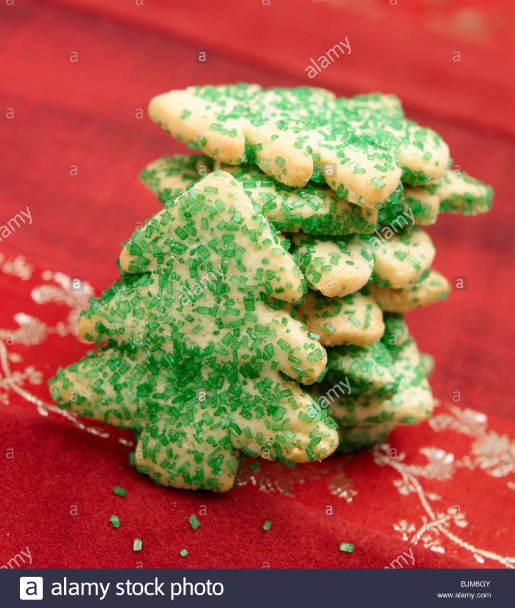 Christmas Tree Sugar Cookies With Green Sprinkles Stock Photo
